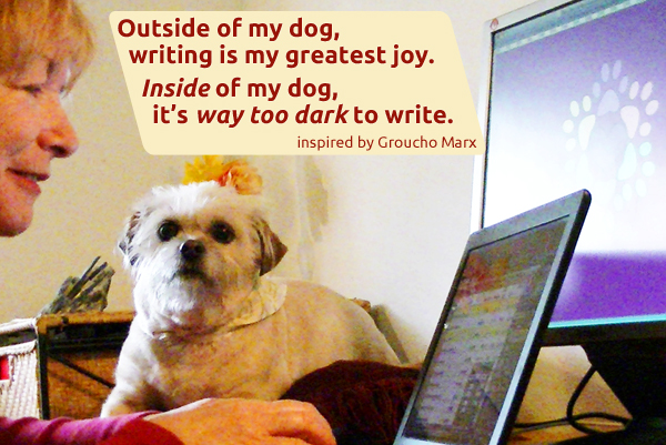 Cute white dog on desk with woman’s hand holding a pen in front of him and text that says “Outside of my dog, writing is my greatest joy. Inside of my dog, it’s way too dark to write.”